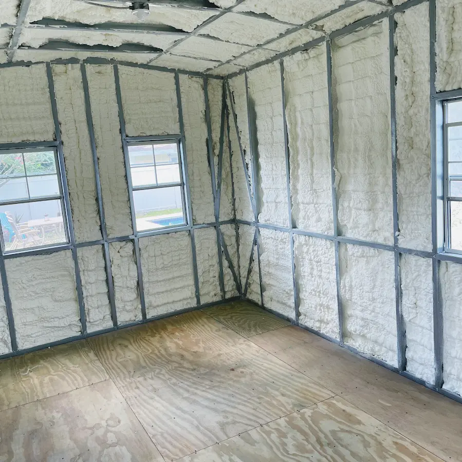 Closed-cell spray foam insulation applied to wall cavities in a residential project in Bessemer City